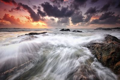 Scenic view of sea against sky during sunset