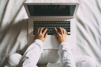 Top view of a doctor working on the computer. doctor investigating.