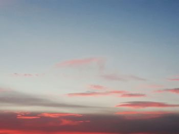 Low angle view of dramatic sky during sunset