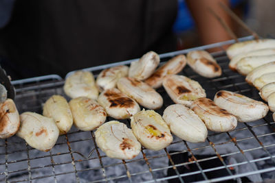 Midsection of man preparing food