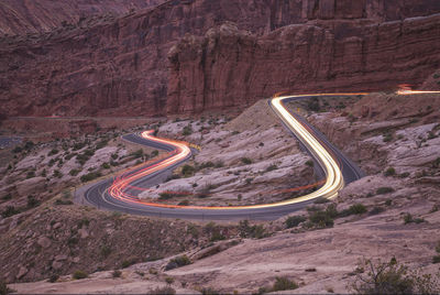 Car trails on the roads of arches national park