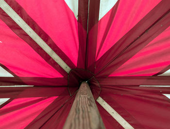 Low angle view of red umbrella