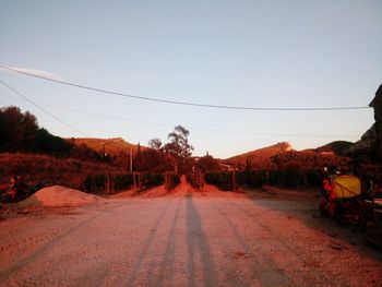 Empty road leading towards mountains