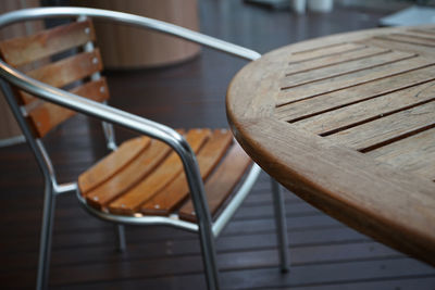 Wooden tables and chairs from an outdoor café
