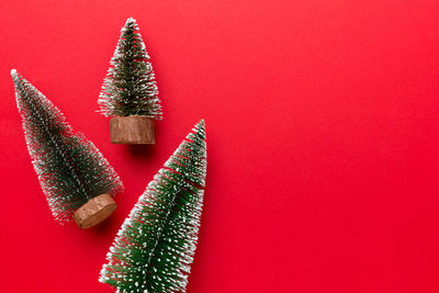 High angle view of christmas tree against yellow background