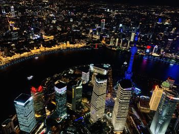 High angle view of illuminated buildings at night