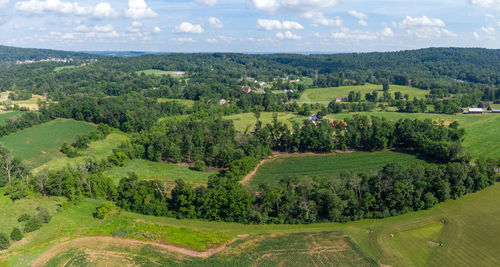 The beauty of the rolling hills and farmland aerial.