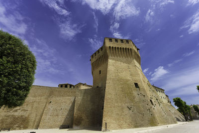 Low angle view of historic building against sky