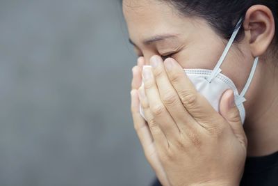 Young woman with protective face mask