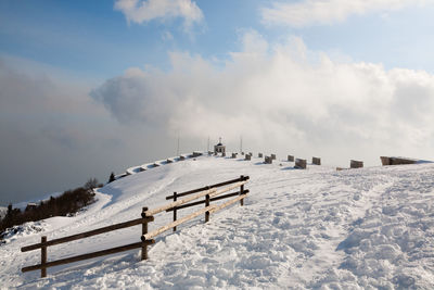 Scenic view of snow covered mountain against sky