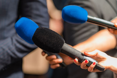 Media interview, a politician at media press conference.