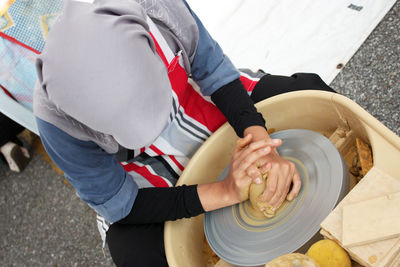 High angle view of man working on street