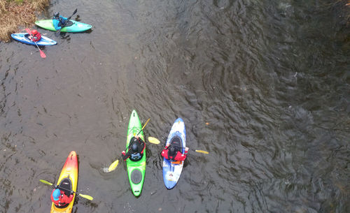 High angle view of people in boat on river