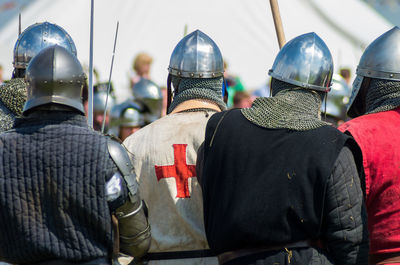 Rear view of men in solider costumes