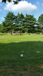View of golf course against sky