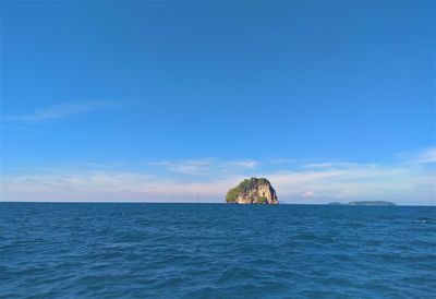 Scenic view of blue sea against sky