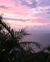 Scenic view of sea against sky at sunset