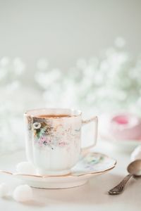 Close-up of tea cup on table