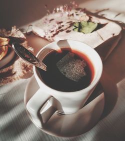 High angle view of coffee cup on table