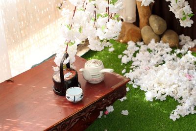White flowers in vase on table