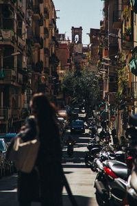 People walking on street in city