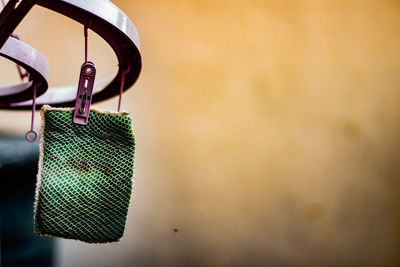 Close-up of padlocks hanging on metal