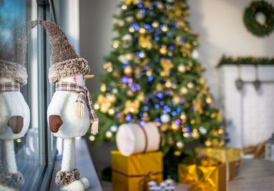 Illuminated christmas tree at home