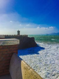 Scenic view of sea against cloudy sky