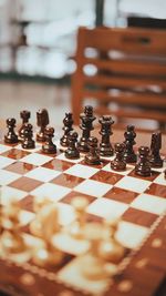 Close-up of chess pieces on board