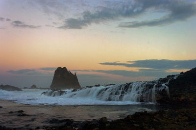 Scenic view of sea against sky during sunset