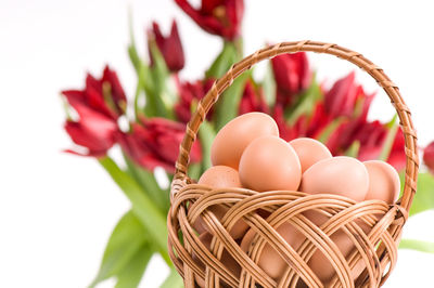 Close-up of brown eggs in basket