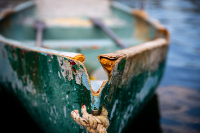 Close-up of rusty fishing boat on sea