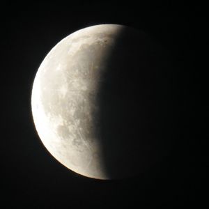 Scenic view of moon against sky at night