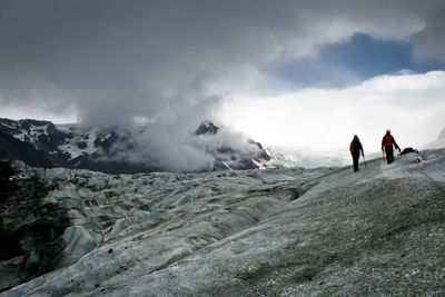 Tourists on mountain landscape