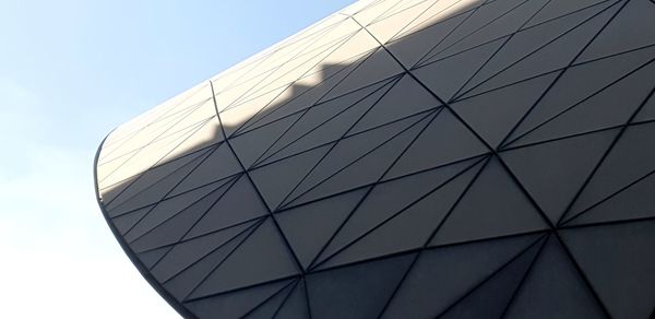 Low angle view of modern building against clear sky