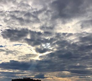 Low angle view of clouds in sky during sunset