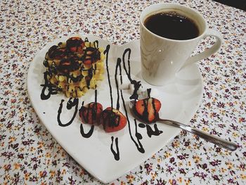 High angle view of coffee on table