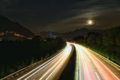 Light trails on road at night