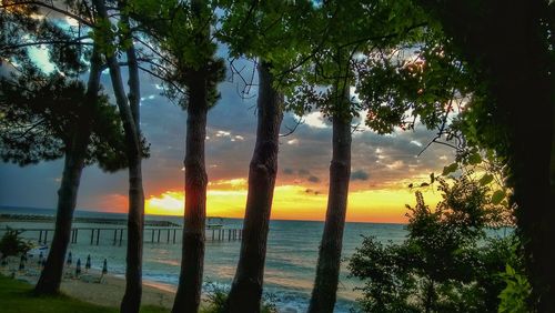 Scenic view of sea against sky at sunset