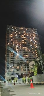 Aerial view of illuminated buildings at night