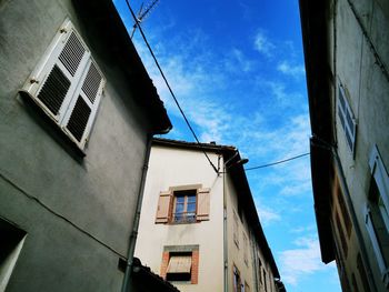 Low angle view of residential buildings against sky