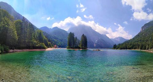 Panoramic view of lago del predil and mountains against sky