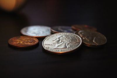 Close-up of coins on table 