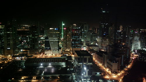 Illuminated cityscape at night