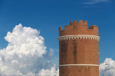 Low angle view of castle against blue sky