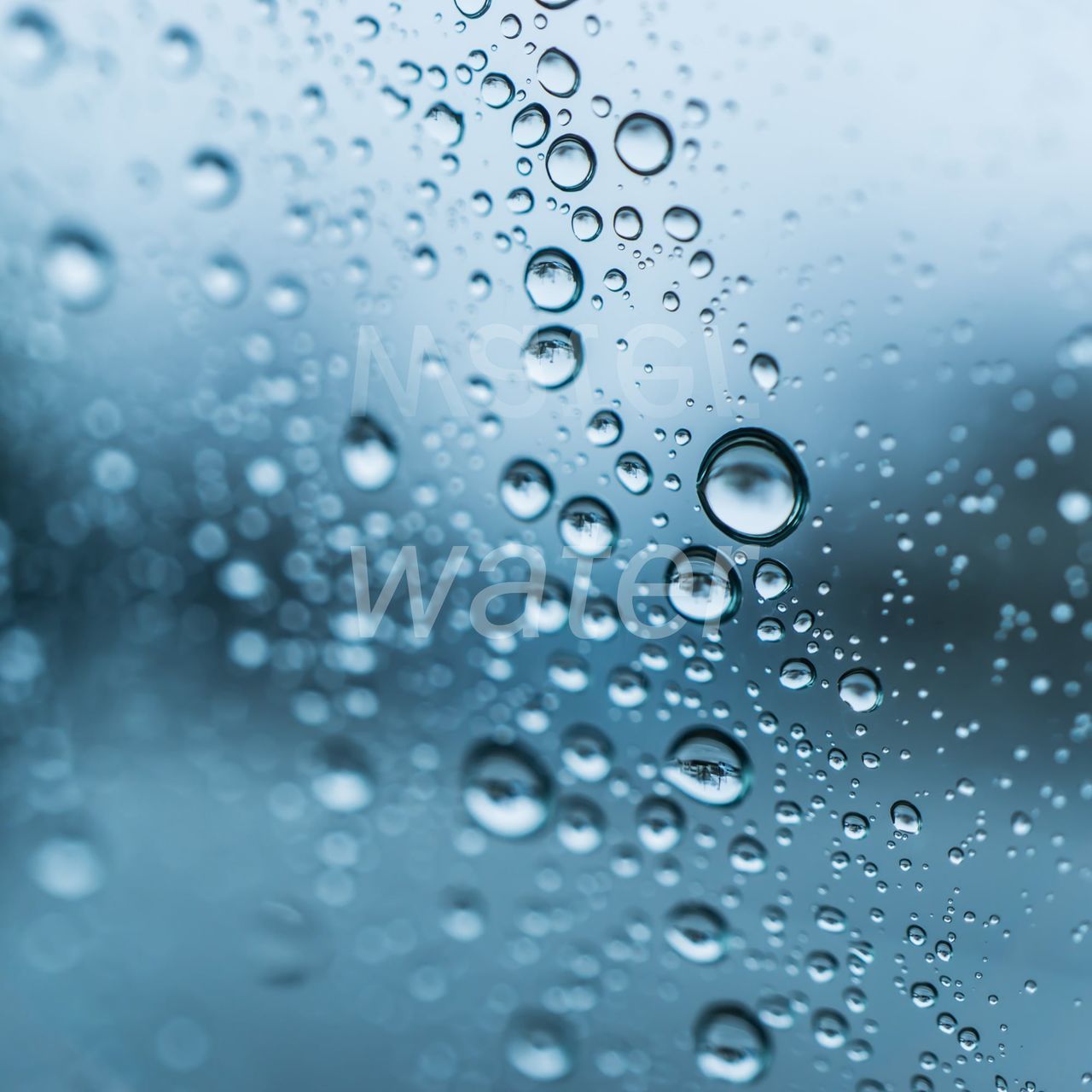 CLOSE-UP OF WET GLASS WINDOW