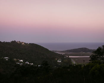 High angle view of plants and sea against sky