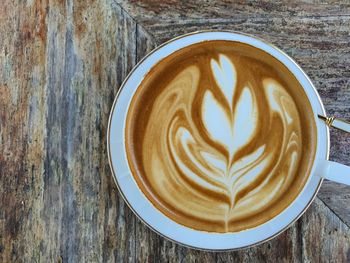 Directly above shot of cappuccino on table