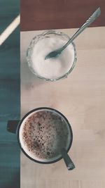 High angle view of coffee cup on table