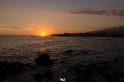 Scenic view of sea against sky during sunset